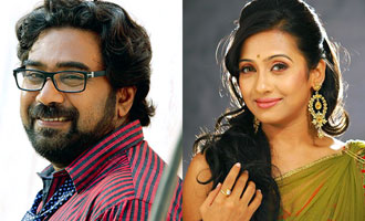 Poojitha Menon as Biju Menon's wife in 'Swarnakaduva'