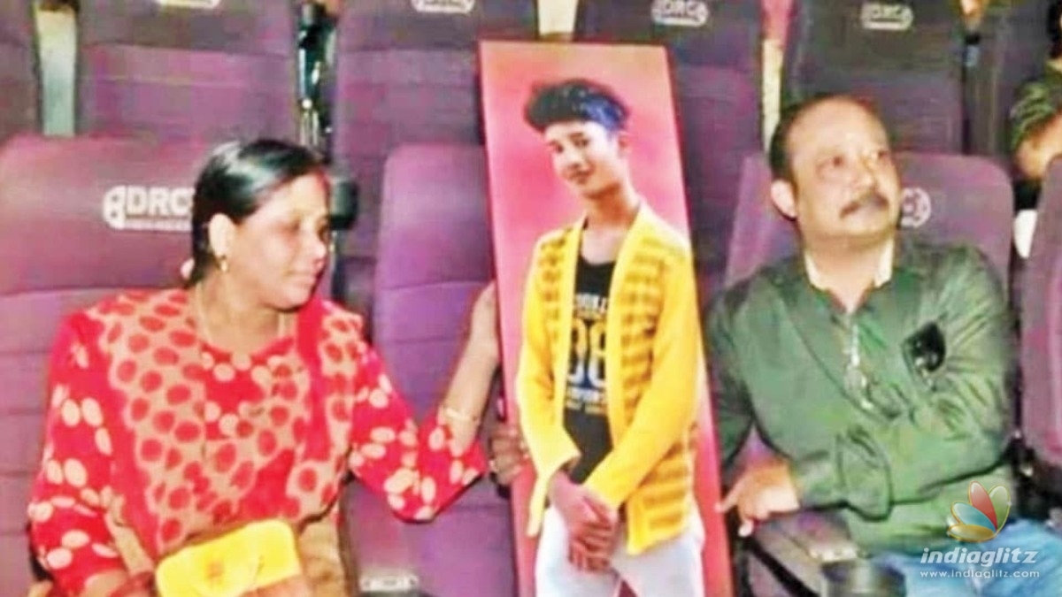  Malayalee family watch movie with life-size photo of their late son 