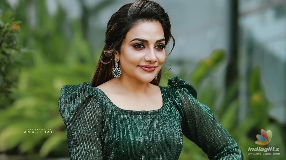 Did Rimi Tomy change her religion? 