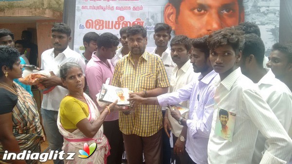 Vishal distributes aid to Gadambaliyoor Village people through his Cuddalore distrct fan club