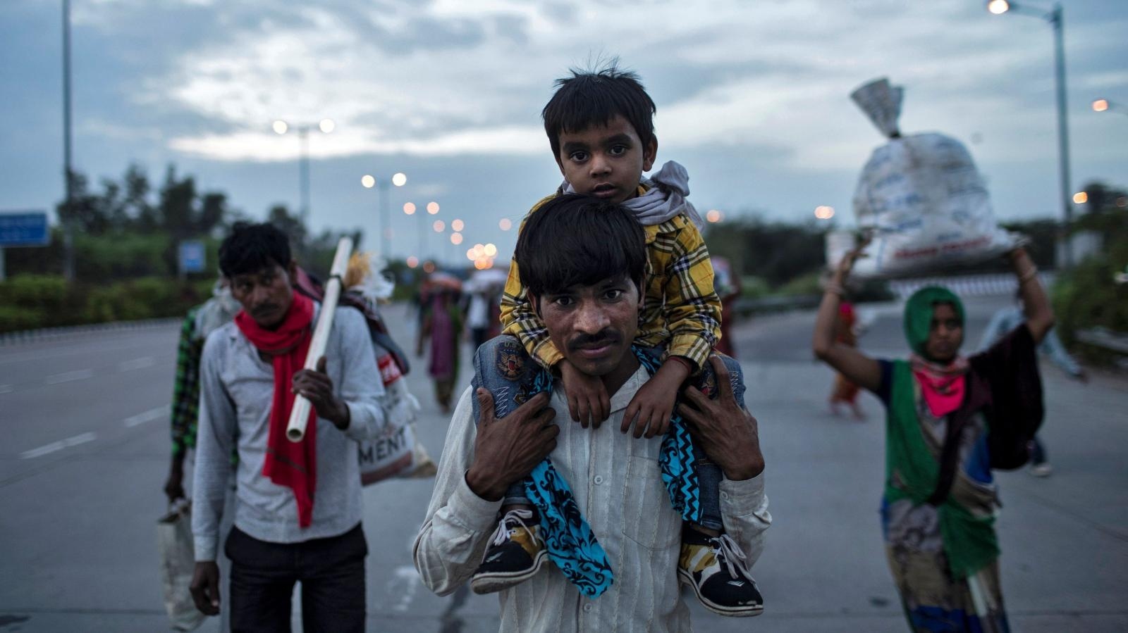 Indian Migrant workers walk miles to reach villages!