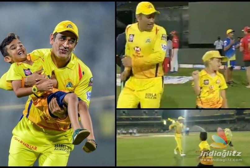 Whoa! Dhoni turns into a child and plays with teammates sons - video