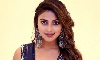 Amala Paul heats up internet with topless bathtub photos