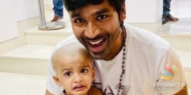 Dhanush does his duty as Thaai Maaman for his niece - Super cute pics out