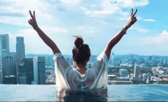 Popular television anchor chills inside rooftop swimming pool pics go viral