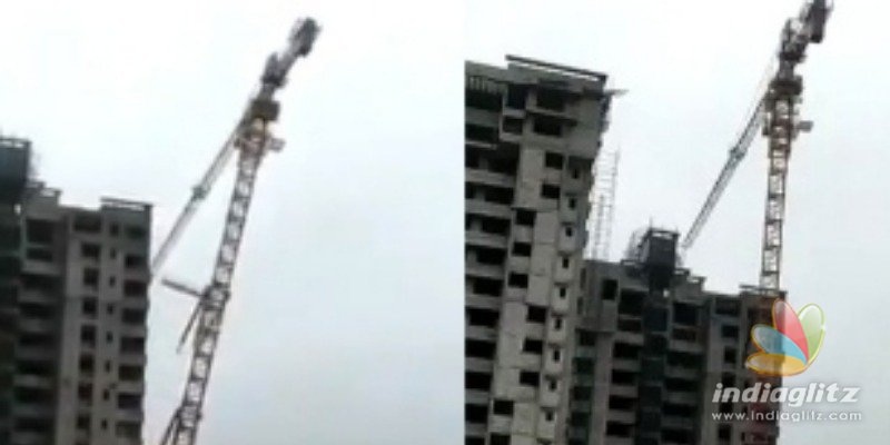 Fani cylone devastation - Video of giant construction crane falling on houses 