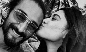 Is the man Oviya is kissing her lover?