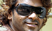 Parthiban, with a gun