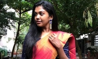 Riythvika  surprises with a cute on road photoshoot in saree