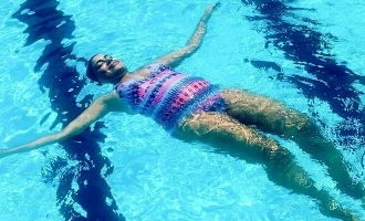 Pregnant Sameera Reddy's swimming photos go viral