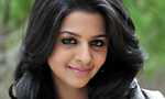 Vedhika for Kaaviyathalaivan