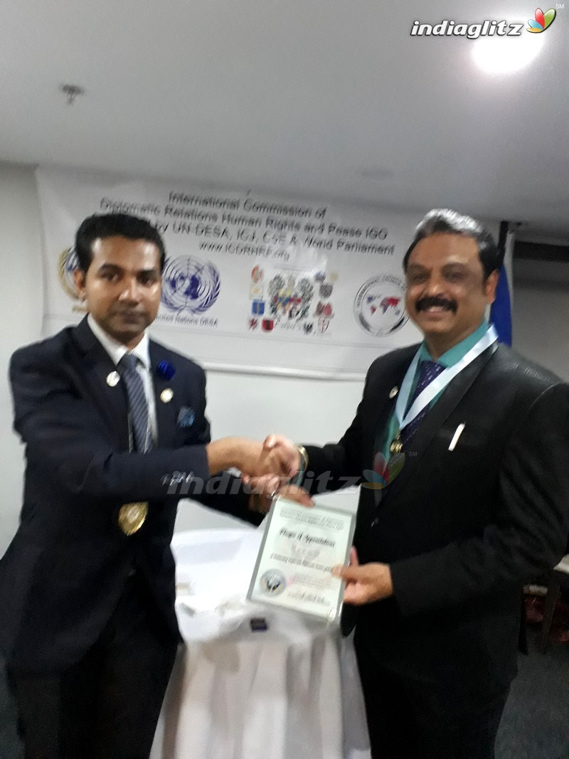 Naresh Receives H.E. Award & PHD from ICDRHRP