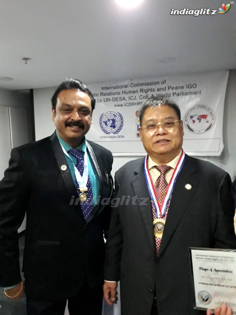 Naresh Receives H.E. Award & PHD from ICDRHRP