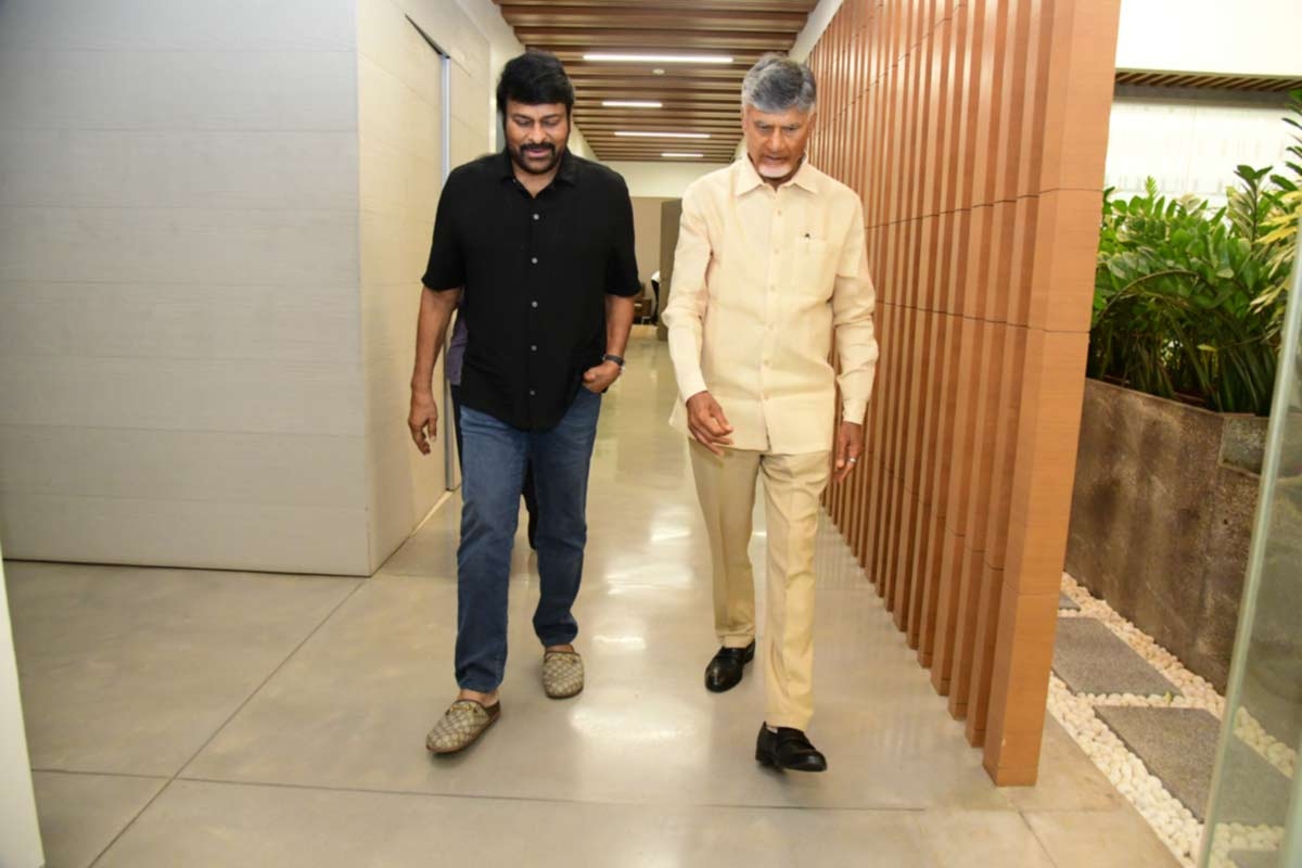 Chiranjeevi handover cheques for flood relief victims personally to AP CM Chandra Babu