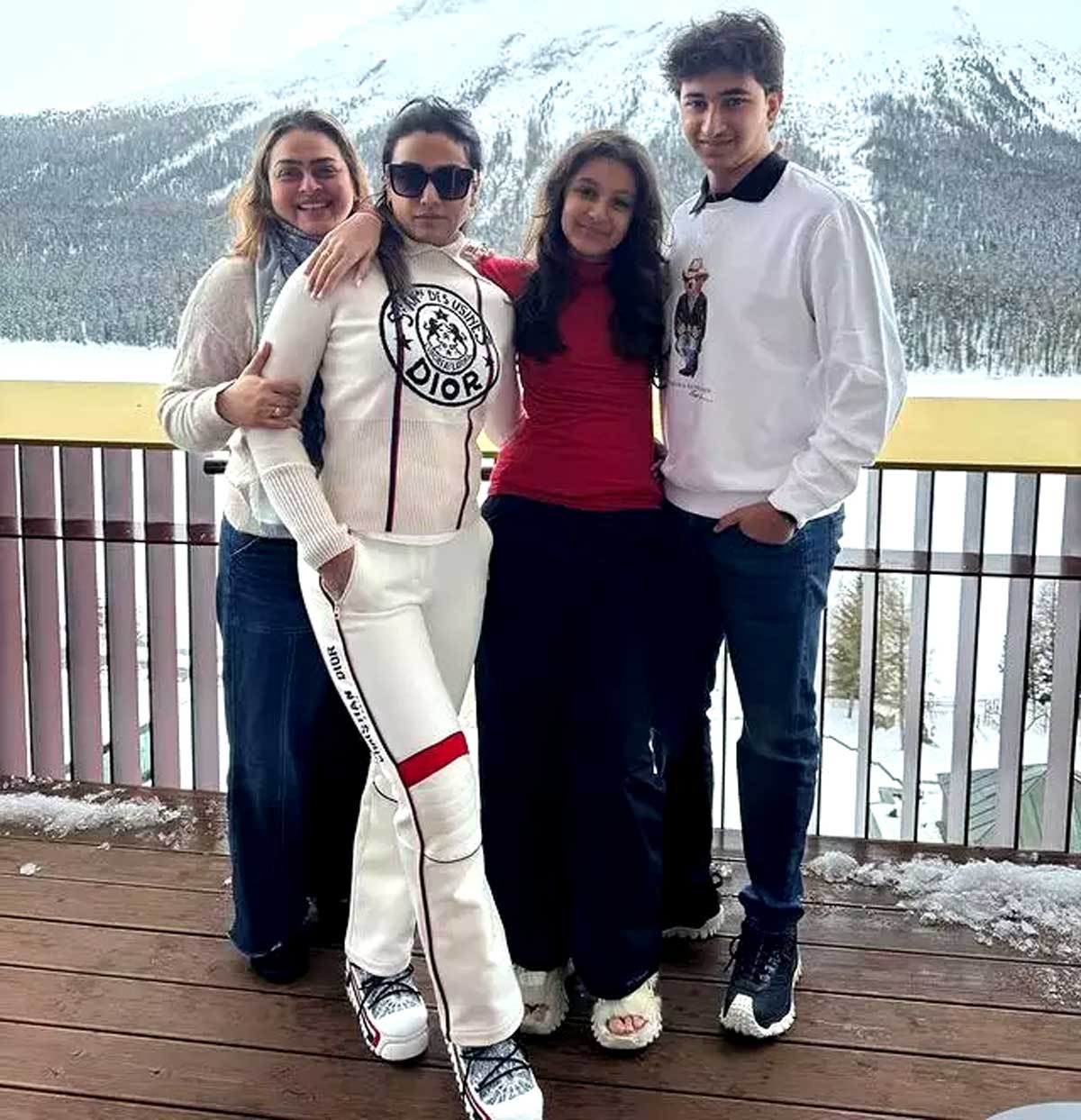 Namrata playful in the snow with Sitara and Gautham