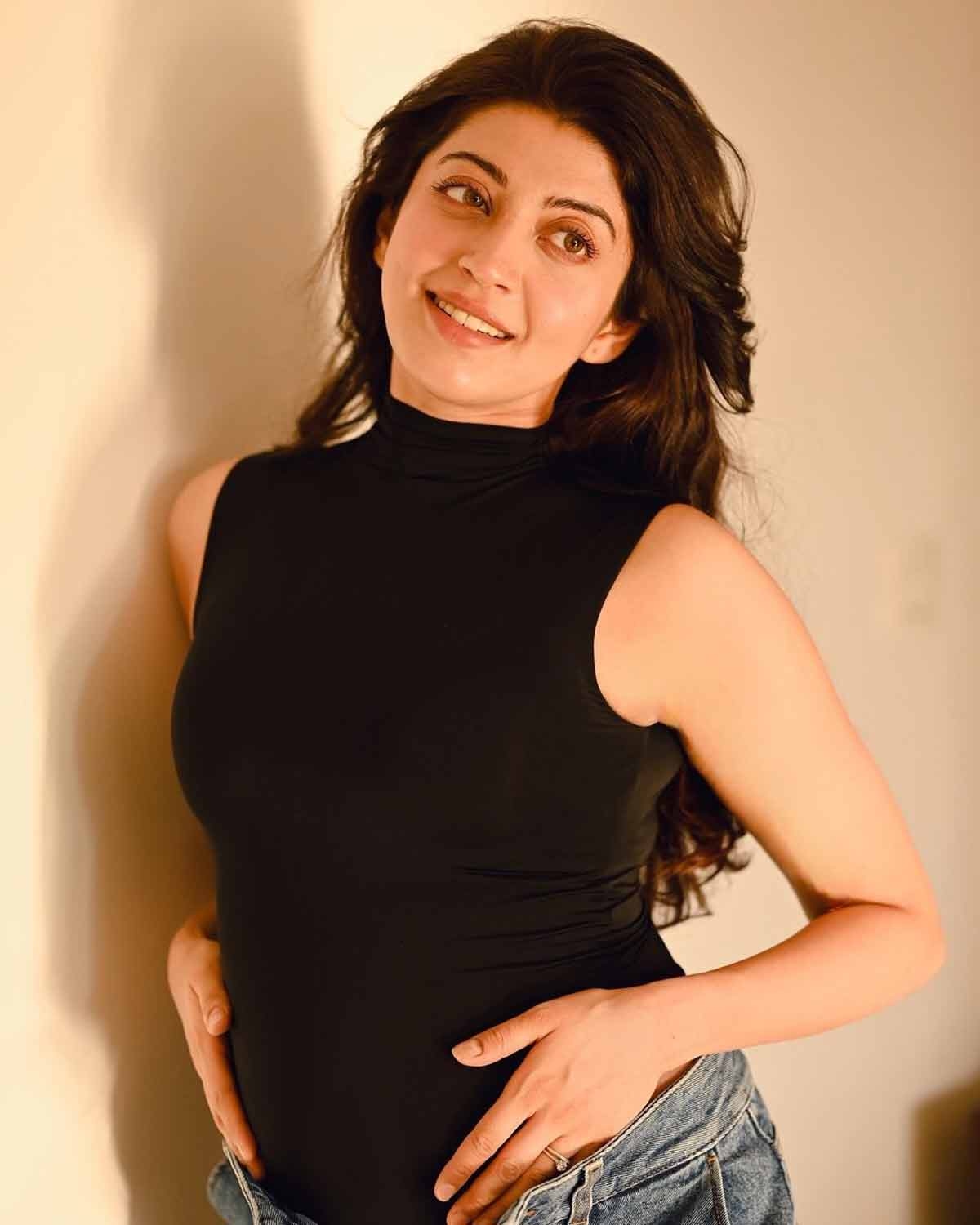 Pawan Kalyans heroine Praneetha shares good news with cute picture