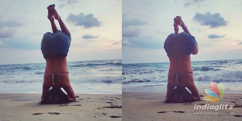 Pic Talk: Amala Pauls difficult Yoga poses on the beach