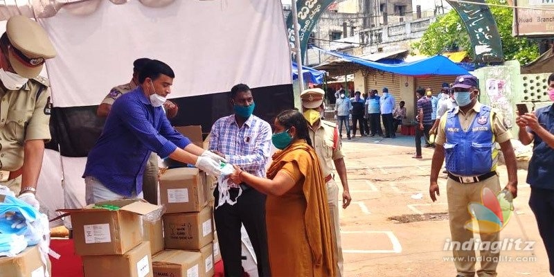 Dil Raju distributes masks & more to police