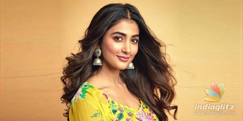 Pooja Hegde busies herself with halwa, pizza & guitar